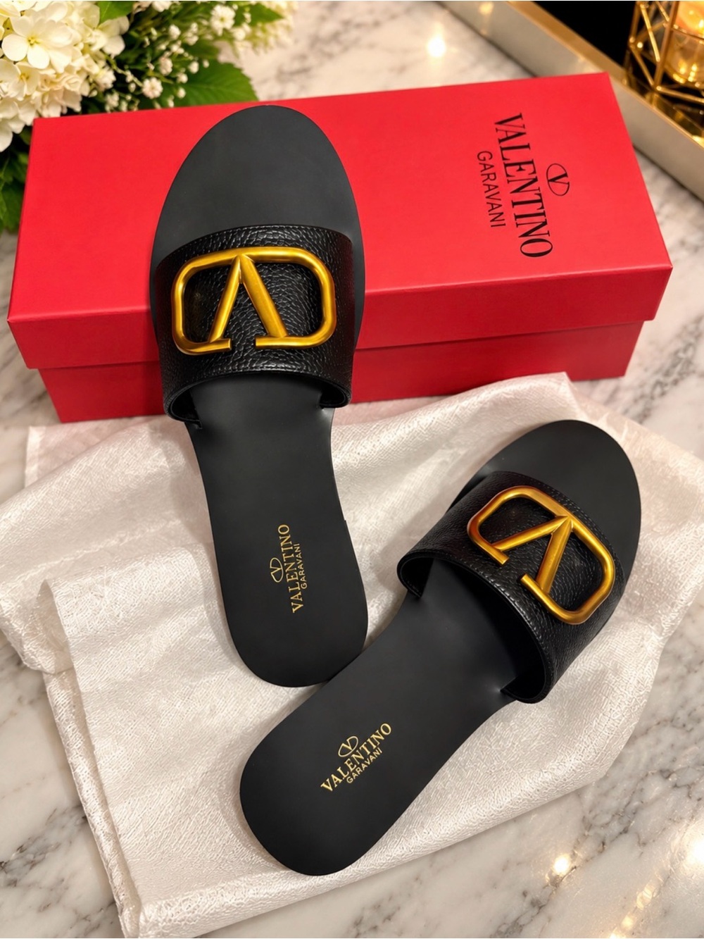 Valentino Garavani Black Slide Sandals with Gold V Logo Hardware